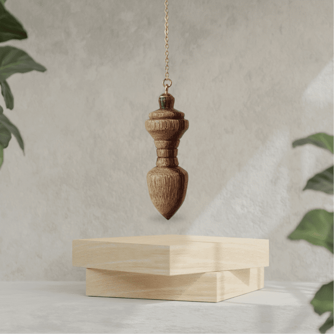 Pendule en bois de serpent